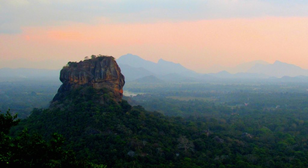 View from Pidurangala Rock at sunset, overlooking Lion Rock, Sigiriya, Sri Lanka.